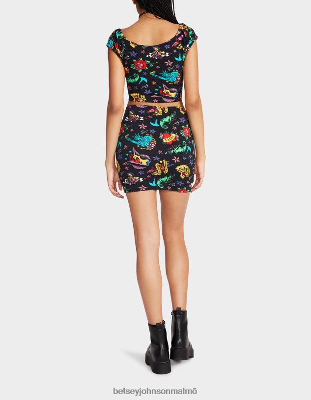 se Betsey Johnson kvinnor 80:e bash tatuering med knäppning framtill i minikjol tatuering pri Kläder 0V8BT288