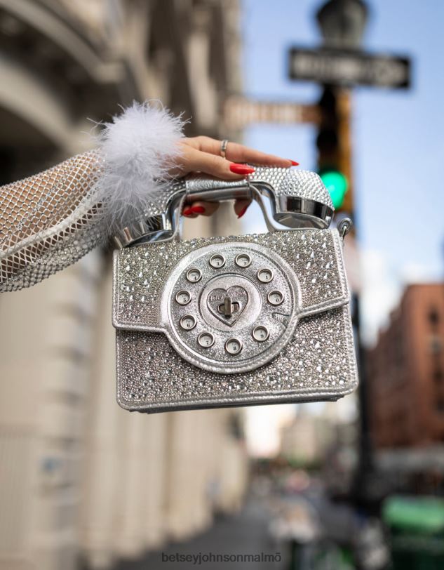 se Betsey Johnson kvinnor kitsch miljoner stjärnor telefonväska silver Tillbehör 0V8BT202